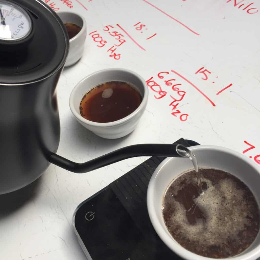 pouring hot water into coffee bowl